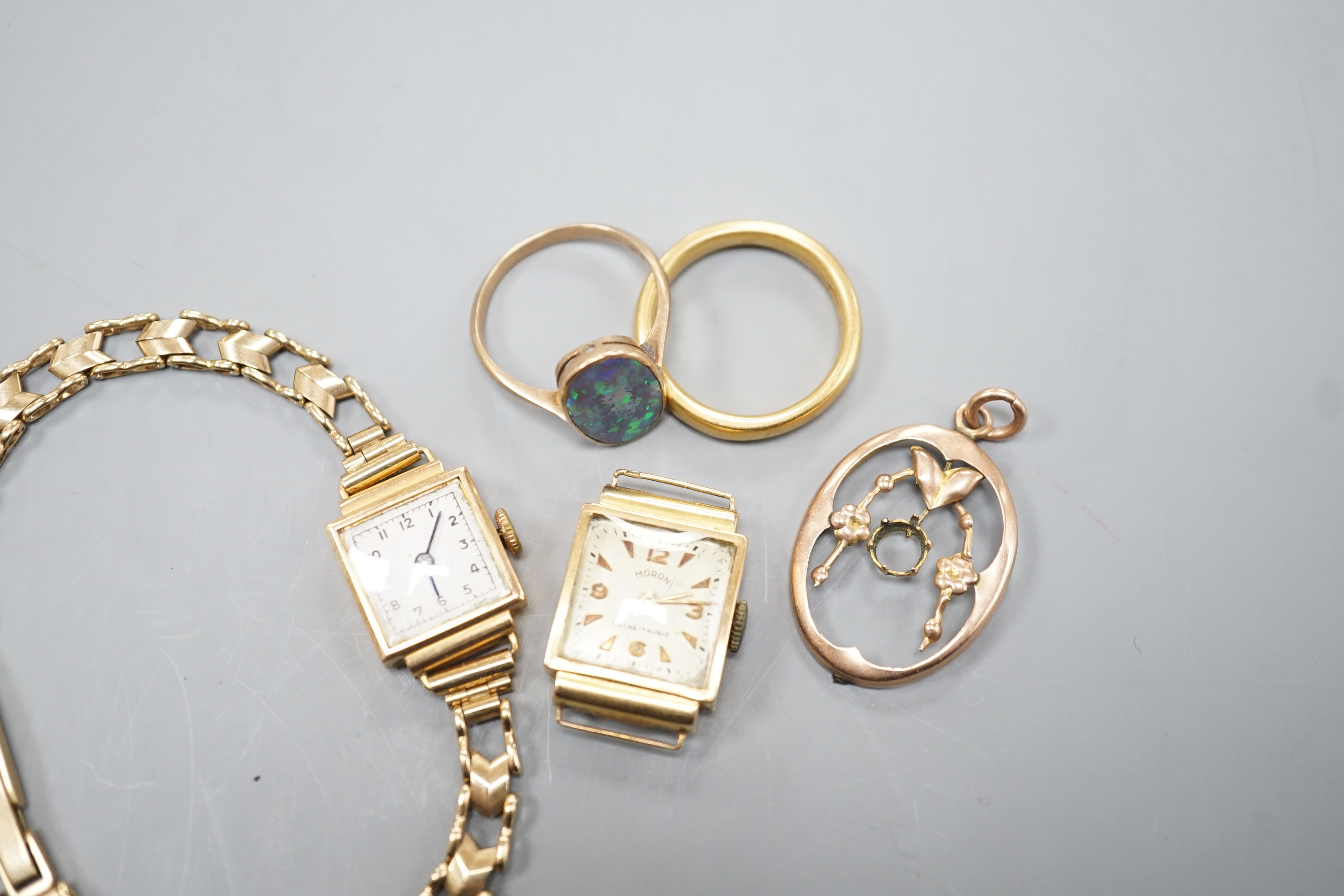 A George V 22ct gold wedding band, size P, 7.3 grams, a 9ct and black opal double set oval ring, a yellow metal pendant frame, a lady's 8k cased manual wind Moron wrist watch(no strap) and another lady's 18k cased manual